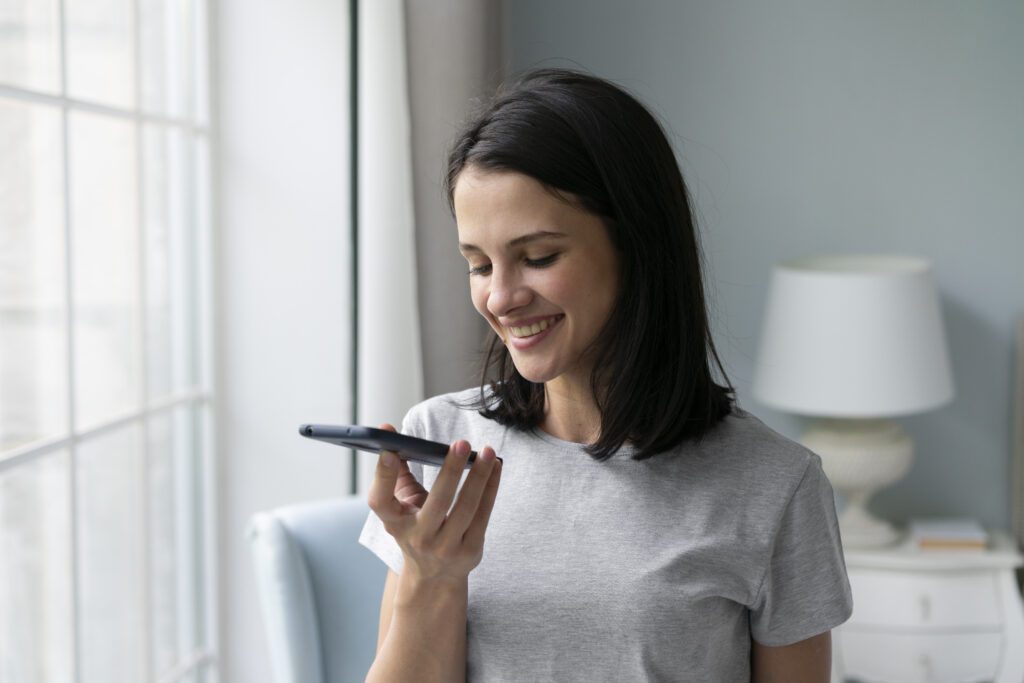 woman holding phone